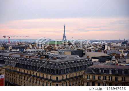 Eiffel Tower skyline and rooftops Paris France 128947428