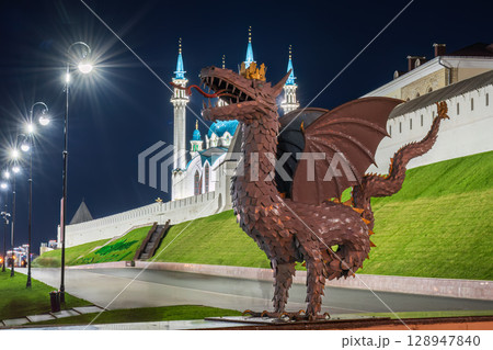Dragon Zilant - the symbol of the city of Kazan and the Kul Sharif mosque of the Kazan Kremlin. Russia. Summer night view 128947840