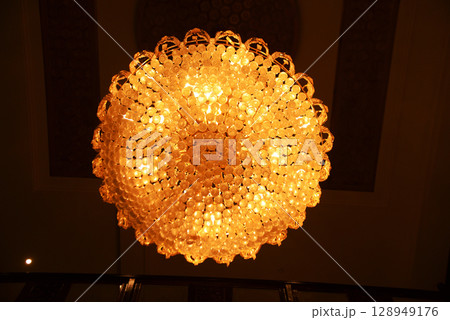 Light from luxury lamp ceiling in the hotel room. 128949176