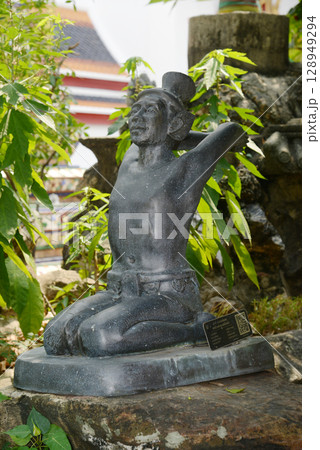 Statue of a hermit performing a massage therapy pose at Wat Phra Chetuphon Wimon Mangkhalaram or Wat Pho. This place is most famous for Thai massage. Located at Bangkok capital city in Thailand. Statue of a hermit performing a massage therapy pose at Wat Phra Chetuphon Wimon Mangkhalaram or Wat Pho. This place is most famous for Thai massage. Located at Bangkok capital city in Thailand. 128949294