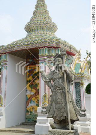 Chinese guardian statue at the gate of Wat Pho Which is one of the largest and oldest temples in Bangkok and is popular with both Thai and foreign tourists. Chinese guardian statue at the gate of Wat Pho Which is one of the largest and oldest temples in Bangkok and is popular with both Thai and foreign tourists. 128949385
