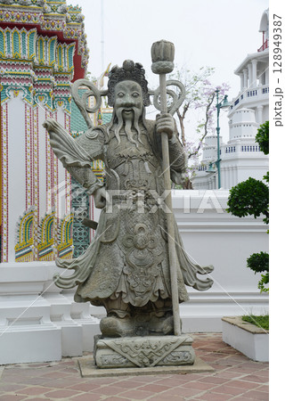 Chinese guardian statue at the gate of Wat Pho Which is one of the largest and oldest temples in Bangkok and is popular with both Thai and foreign tourists. Chinese guardian statue at the gate of Wat Pho Which is one of the largest and oldest temples in Bangkok and is popular with both Thai and foreign tourists. 128949387