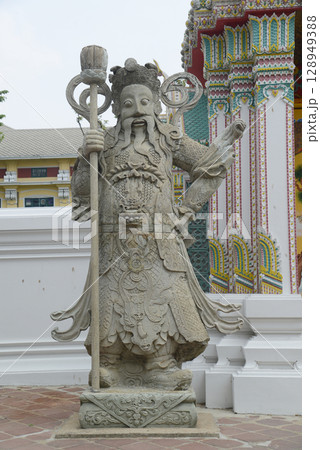Chinese guardian statue at the gate of Wat Pho Which is one of the largest and oldest temples in Bangkok and is popular with both Thai and foreign tourists. Chinese guardian statue at the gate of Wat Pho Which is one of the largest and oldest temples in Bangkok and is popular with both Thai and foreign tourists. 128949388