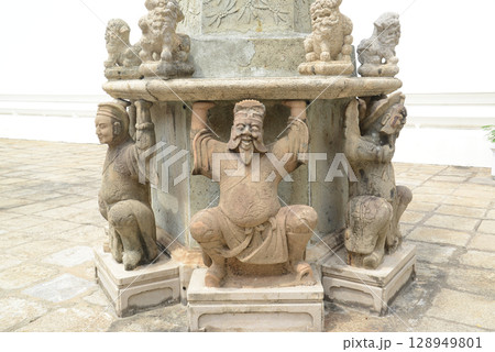 Chinese statue of pagoda art at Wat Phra Chetuphon or Wat Pho, one of the largest and oldest temples and a popular destination for both Thai and foreign tourists. Located at Bangkok city in Thailand. 128949801