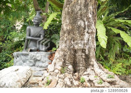 Statue of a hermit performing a massage therapy pose at Wat Phra Chetuphon Wimon Mangkhalaram or Wat Pho. This place is most famous for Thai massage. Located at Bangkok capital city in Thailand. Statue of a hermit performing a massage therapy pose at Wat Phra Chetuphon Wimon Mangkhalaram or Wat Pho. This place is most famous for Thai massage. Located at Bangkok capital city in Thailand. 128950026