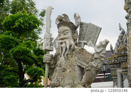 Chinese guardian statue at the gate of Wat Pho Which is one of the largest and oldest temples in Bangkok and is popular with both Thai and foreign tourists. Chinese guardian statue at the gate of Wat Pho Which is one of the largest and oldest temples in Bangkok and is popular with both Thai and foreign tourists. 128950146