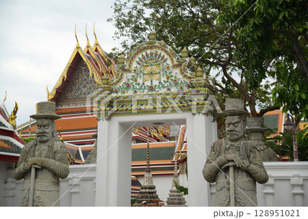Chinese guardian statue at the gate of Wat Pho Which is one of the largest and oldest temples in Bangkok and is popular with both Thai and foreign tourists. Chinese guardian statue at the gate of Wat Pho Which is one of the largest and oldest temples in Bangkok and is popular with both Thai and foreign tourists. 128951021