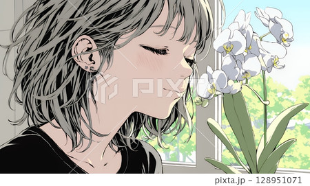 蘭の花と若い女性