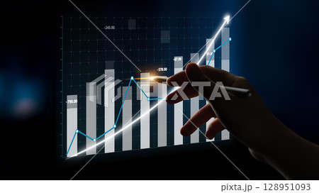 Hand pointing at an upward trending bar chart with glowing lines and data points illustrating financial growth and analysis Impute Hand pointing at an upward trending bar chart with glowing lines and data points illustrating financial growth and analysis Impute 128951093