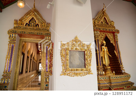 The standing Buddha statue is made of bronze and is enshrined in Wat Phra Chetuphon Wimonmangklaram or Wat Pho is popular with both Thai and foreign tourists. Located at Bangkok city in Thailand. The standing Buddha statue is made of bronze and is enshrined in Wat Phra Chetuphon Wimonmangklaram or Wat Pho is popular with both Thai and foreign tourists. Located at Bangkok city in Thailand. 128951172