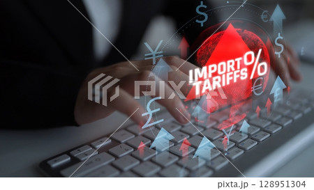 Hands Typing on Keyboard with Import Tariffs Graphic Overlay Highlighting Economic Impact of Tariffs in Digital Commerce and International Trade. Consignment Hands Typing on Keyboard with Import Tariffs Graphic Overlay Highlighting Economic Impact of Tariffs in Digital Commerce and International Trade. Consignment 128951304