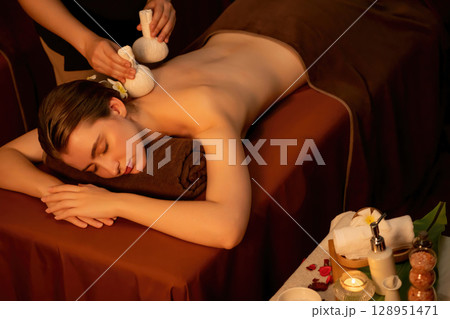 Hot herbal ball spa massage body treatment. Quiescent 128951471