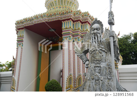 Chinese guardian statue at the gate of Wat Pho Which is one of the largest and oldest temples in Bangkok and is popular with both Thai and foreign tourists. Chinese guardian statue at the gate of Wat Pho Which is one of the largest and oldest temples in Bangkok and is popular with both Thai and foreign tourists. 128951568