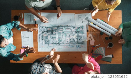 Top view of civil engineer team clapping hand while giving high five. Symposium. 128951632