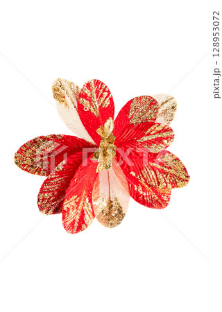 Red poinsettia flower with shiny golden glitter placed on clean white background. Classic artificial Christmas decor for handmade seasonal design. 128953072