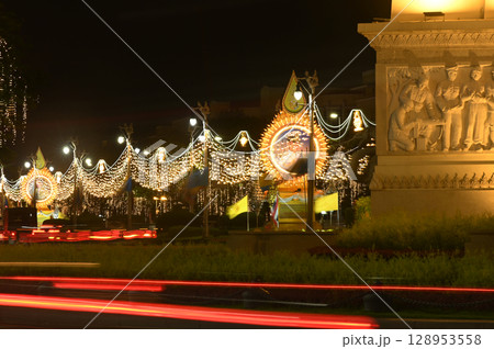 Night time of light decorations at the Democracy Monument and Ratchadamnoen Road for the birthday celebration of King Rama X. 128953558