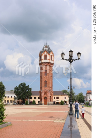 The Historic Clock Tower stands majestically in the Urban Plaza beneath a Scenic Sky 128956790