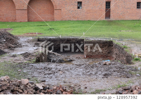 The excavation site has revealed several remarkable historical structures located in a wetland area The excavation site has revealed several remarkable historical structures located in a wetland area 128957392