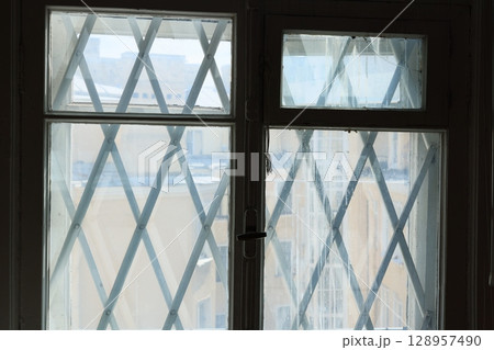 Exploring Geometric Window Design Featuring an Intricate Cross Pattern for Aesthetic Appeal Exploring Geometric Window Design Featuring an Intricate Cross Pattern for Aesthetic Appeal 128957490