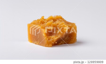 Handmade butterscotch or toffee candy showing artisanal confectionery craftsmanship 128959809