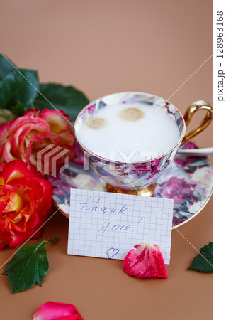 Morning break, roses decorate a card with gratitude Morning break, roses decorate a card with gratitude 128963168