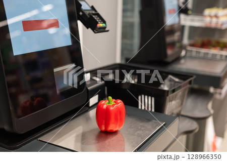 Bell peppers at the self-checkout.  128966350