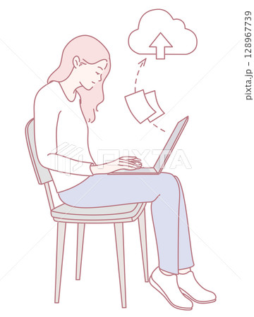 A woman is actively using her laptop to upload files to the cloud for storage and sharing 128967739