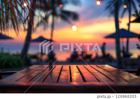 Stunning blurred exotic beach sunset with palm trees: mock-up table for summer products 128968203