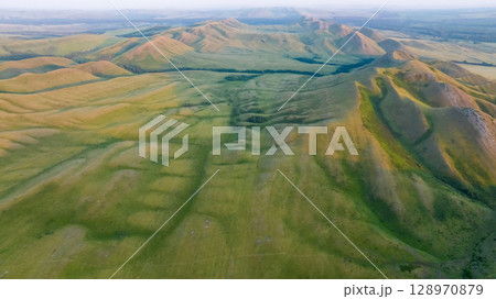 Hills stretching into the distance. Orenburg 128970879