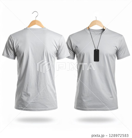 Two Gray T Shirts Hanging on Wooden Hangers in Isolated White Background 128972583