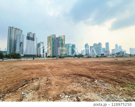 building on construction site in progress 128975250