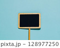 Blank Mini Chalkboard Sign on Blue, Message and Promotion 128977250