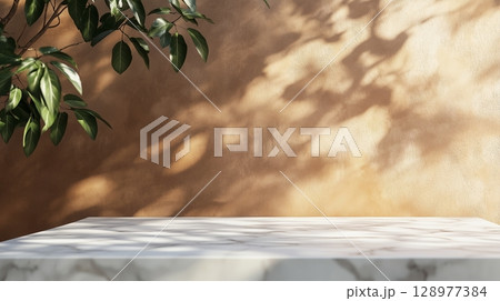 Table top white marble counter copy space cement wall with shadow sunlight from plant 128977384