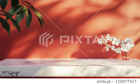 Table top white marble counter copy space cement wall with shadow sunlight from plant 128977427
