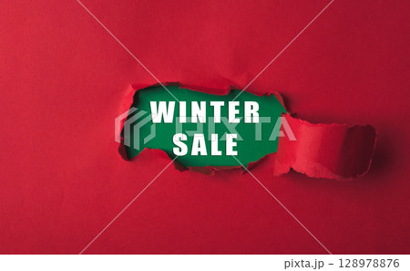 Red background with a green word that says Winter Sale 128978876