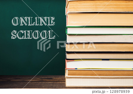 The books are piled on top of each other, creating a sense of importance 128978939