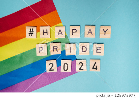 A rainbow flag with the hashtag HappyPride2024 128978977