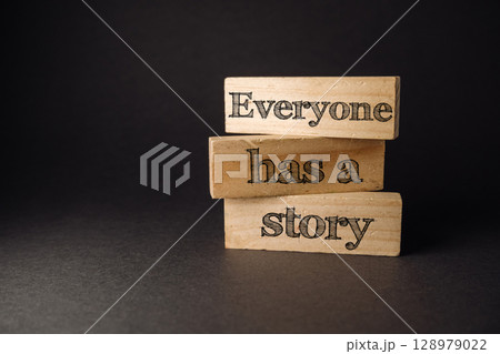 Three wooden blocks stacked on top of each other with the words "everybody has a 128979022