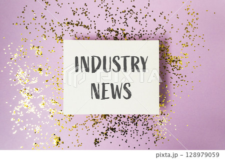 White sign with the word Industry News written on it 128979059