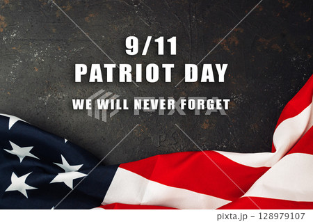 Flag with the words Patriot Day written below it 128979107