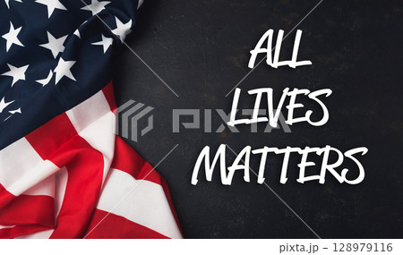 Red and white American flag with the words All Lives Matter written underneath it. 128979116