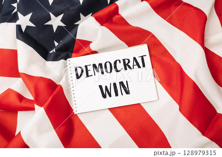 a white piece of paper that says Democrat win a white piece of paper that says Democrat win 128979315