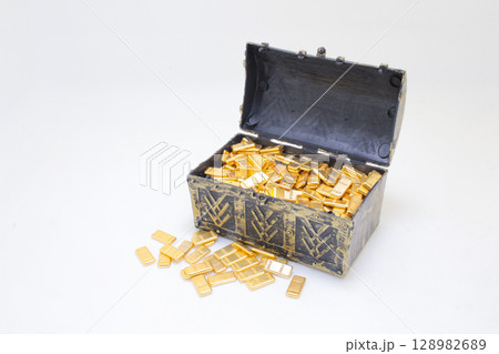 Ancient Treasure Chest Overflowing With Gold Bars on White Background Ancient Treasure Chest Overflowing With Gold Bars on White Background 128982689