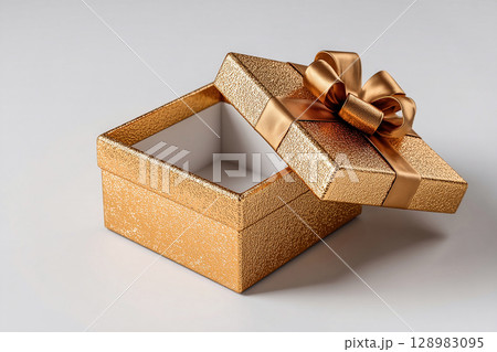 Elegant present. Gold decor. Opened elegant square box. Jewelry, birthdays and luxury branding. 128983095