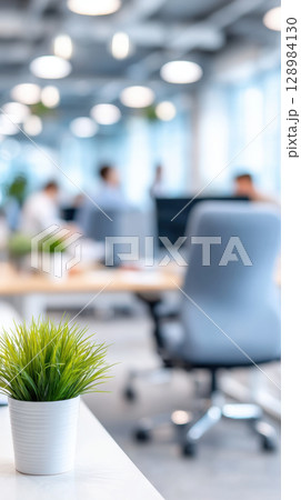 Modern corporate office interior shows professional team in business meeting and collaboration with teamwork and discussion in bright boardroom 128984130