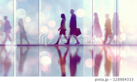 Office workers walking modern corporate building hallway during morning rush create light reflection urban workplace environment daily commute Office workers walking modern corporate building hallway during morning rush create light reflection urban workplace environment daily commute 128984333