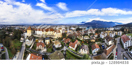 France travel and landmarks. Romantic beautiful old town of Annecy, aerial drone panoramic view with medieval castle. France travel and landmarks. Romantic beautiful old town of Annecy, aerial drone panoramic view with medieval castle. 128984838