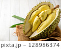 Durian fruit. Ripe monthong durian on sack and white wood background, king of fruit from Thailand on summer 128986374