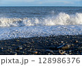 Big wave and black stone beach at Miho no Matsubara, UNESCO World Heritage Site 128986376
