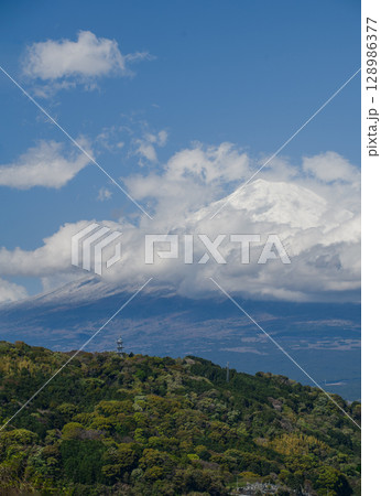 landscape captures the peaceful coexistence of urban life and nature in rural Japan. In the distance, the iconic Mount Fuji rises majestically, Japan landscape captures the peaceful coexistence of urban life and nature in rural Japan. In the distance, the iconic Mount Fuji rises majestically, Japan 128986377